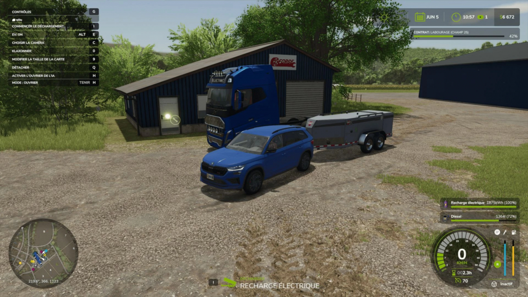 FS25 mod FST 990 + Ev v1.0.0.0 features a blue SUV and trailer near a shed, showcasing game controls and map in Farming Simulator 25.