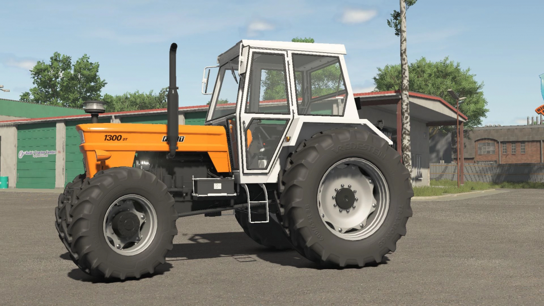 Fiat 1300DT tractor in FS25 mod parked outside a garage, showcasing its classic design.