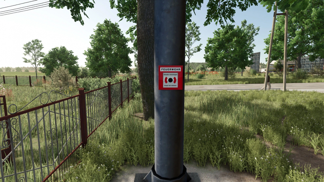 FS25 mod Fire Siren v1.0.0.0 on utility pole in rural landscape, Farming Simulator 25.