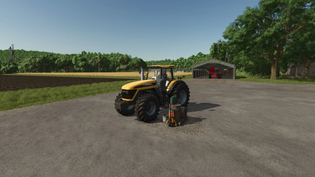 FS25 mod Gas Station v1.0.0.0 with yellow tractor in a farm setting.