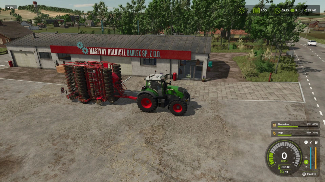 FS25 mod showing Horsch Pronto 9 DC seeder attached to tractor in front of farm building.