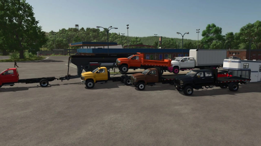 Various International CV Series trucks in different colors showcased in Farming Simulator 25 mod update.