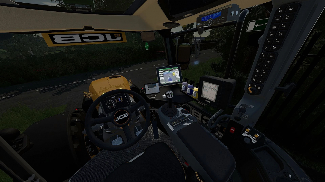 Interior view of JCB Fastrac Edit mod in FS22, showcasing dashboard controls and monitor in Farming Simulator 22.