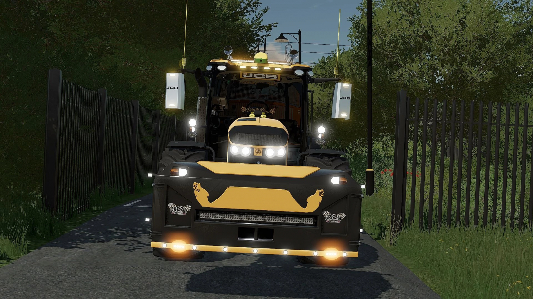 FS22 mod JCB Fastrac tractor with custom front design on a forest road in Farming Simulator 22. 