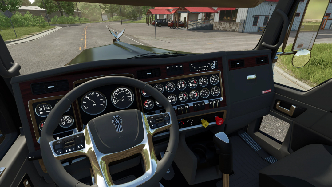 Kenworth W900L truck interior in FS25 mod, dashboard with gauges and steering wheel view.