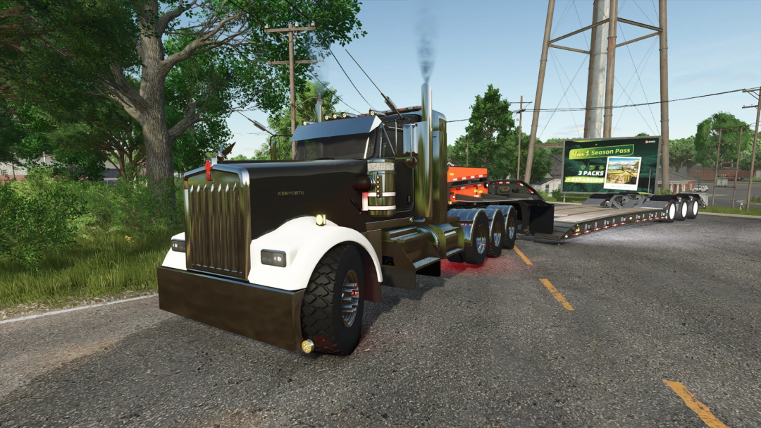 Kenworth W900L truck mod in FS25, featuring a heavy-duty trailer on a rural road.