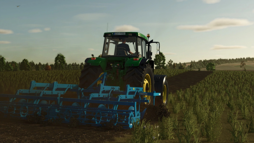 FS25 mod Lemken Smaragd 9/400 plowing a field with a tractor in Farming Simulator 25.