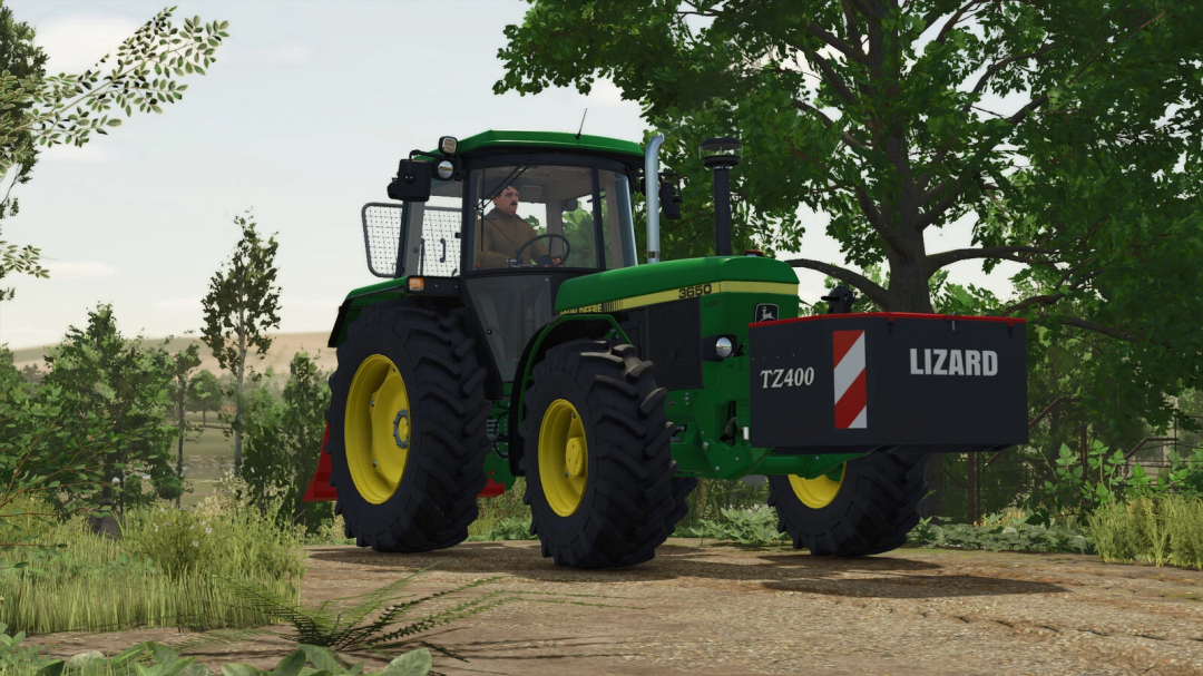 FS25 mod Lizard TZ400 v1.0.0.0 tractor on a dirt road surrounded by trees.