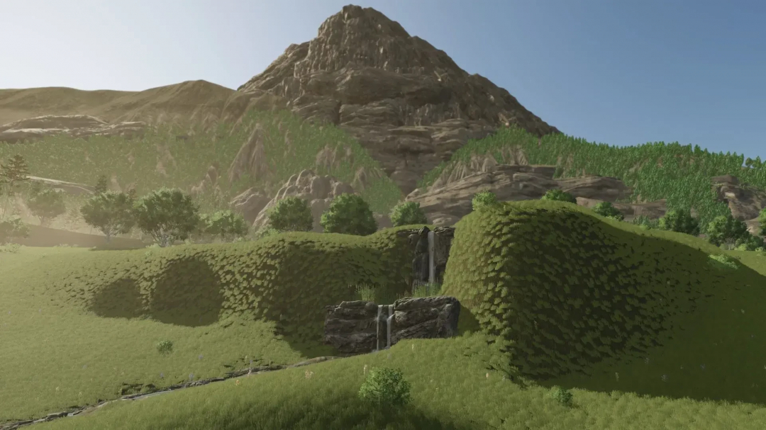 Scenic mountain landscape with greenery and a waterfall on the LoneHills Map in FS25 mod.