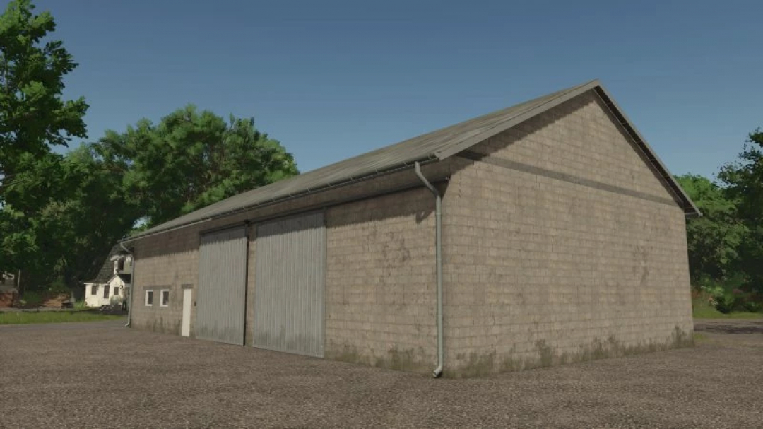 FS25 mod Old Grain SM Warehouse v1.0.0.0, depicting a large stone warehouse with metal doors, surrounded by trees.