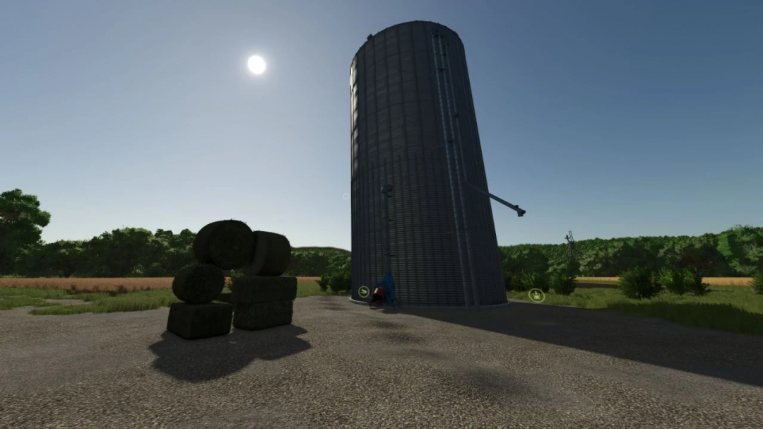 FS25 Real Feed Pack v2.0.0.2 mod shows a tall silo and hay bales under a bright sky, enhancing farming realism.