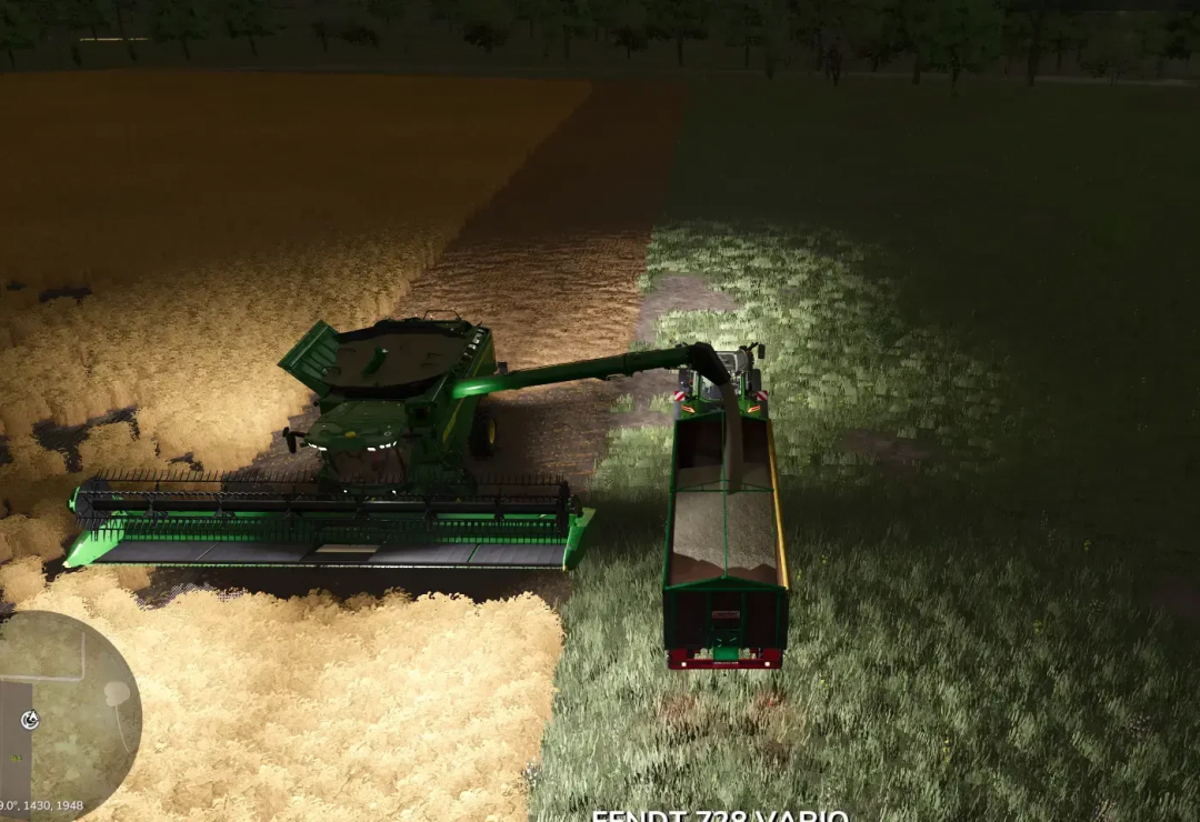 FS25 mod image of a combine harvester unloading into a Kröger HKD 402 trailer at night.