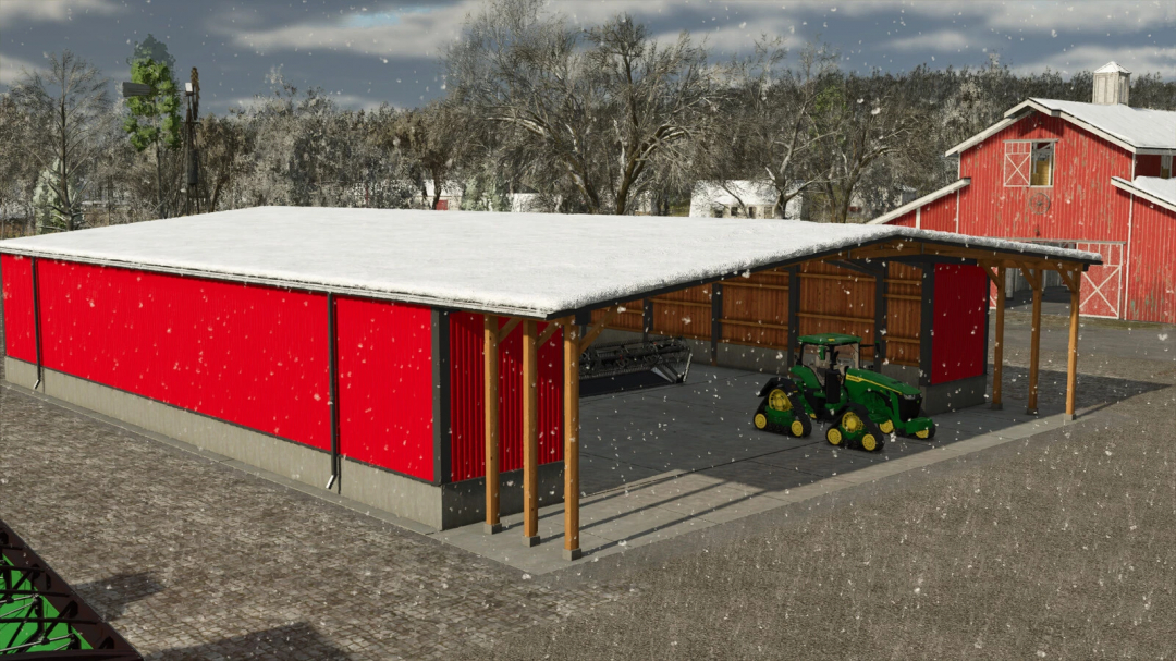 Wide Garage mod for FS25 showcasing snow-covered red garage with green tractor inside.