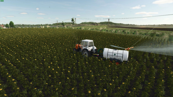 fs25-mods,  Tractor with Caprari Agricultural Trailer v1.0.0.0 mod in FS25 watering sunflower field