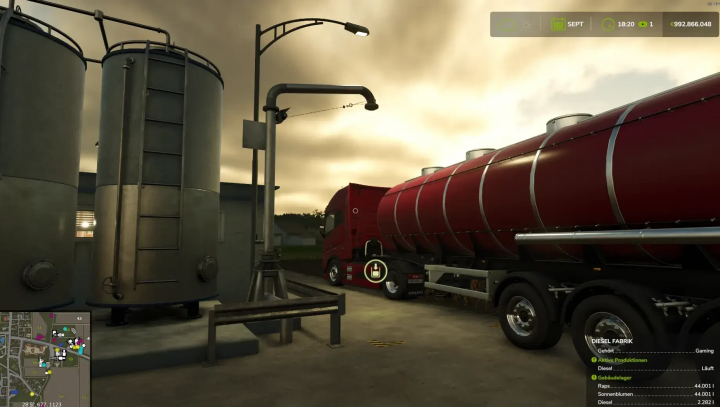 fs25-mods, Diesel factory mod in FS25 with a red tanker truck and storage tanks.