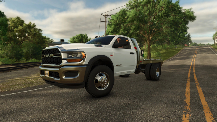 fs25-mods,  FS25 mod Dodge Ram 5500 v1.0.0.0 on a rural road, showcasing detailed design and realistic graphics in Farming Simulator 25.