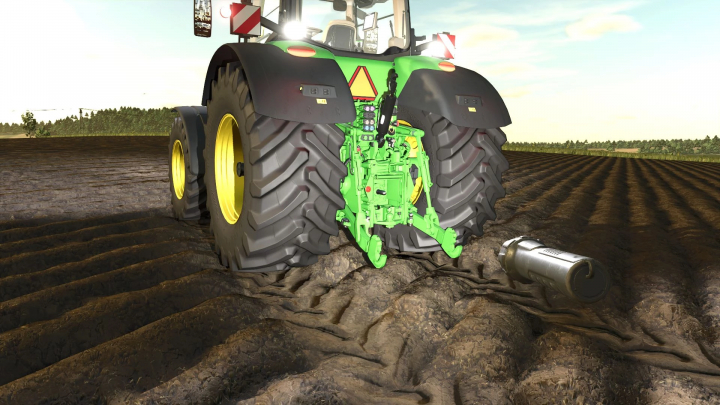 fs25-mods,  Rear view of John Deere 8R 2016 mod in FS25, showcasing its details on a plowed field.