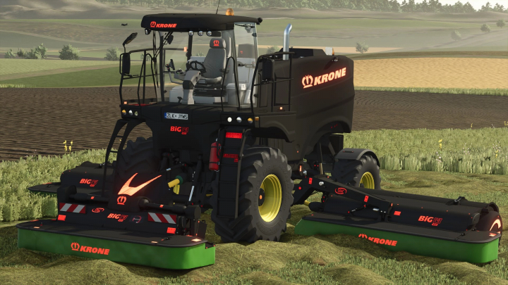 fs25-mods,  Krone Big M 450 Black Edition in FS25 mod seen in a grassy field.