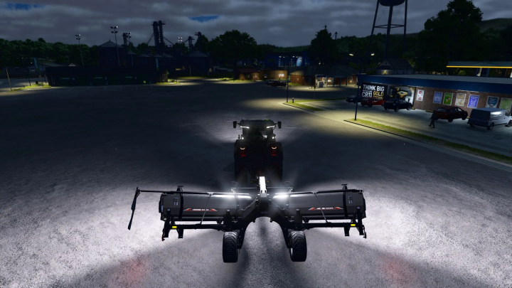 fs25-mods, FS25 mods: Kuhn Merge Maxx 950 Special Edition at night, with tractor lights on, in Farming Simulator 25.