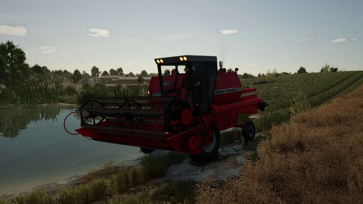 fs25-mods,  Massey Ferguson 310 combine harvester by a pond in FS25 mod.