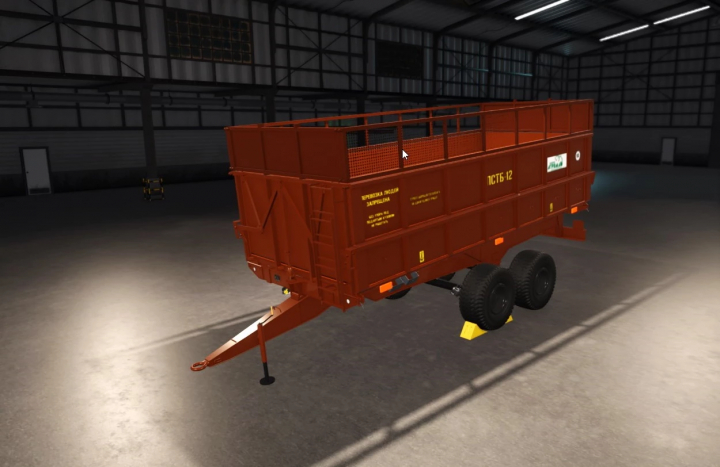 fs25-mods,  FS25 mod PSTB v1.0.2 showcases a red agricultural trailer in a warehouse setting.