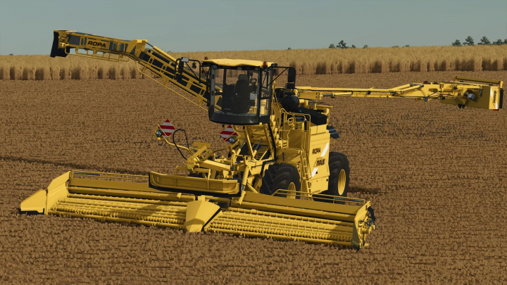 fs25-mods, Ropa Maus 5 v1.0.0.0 mod in Farming Simulator 25, showcasing a yellow agricultural machine in a field.