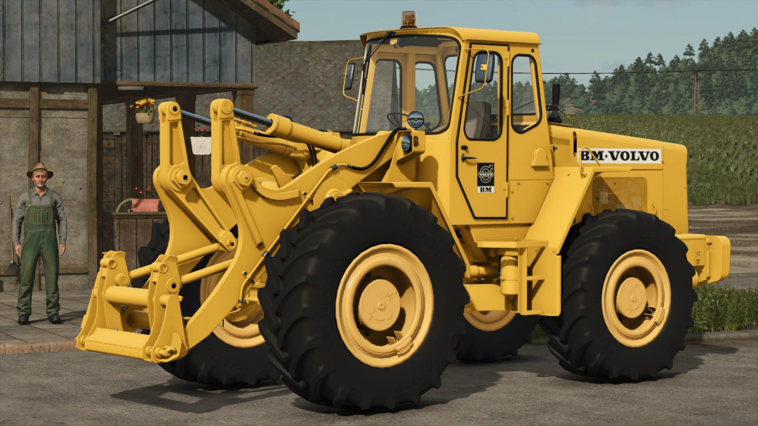 BM Volvo LM 845 mod for FS25, showcasing a yellow loader in a rural setting.