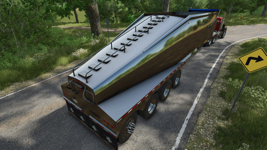 FS25 mod Beall Bullet Quad Axle Belly Dump trailer on a road, surrounded by green trees.