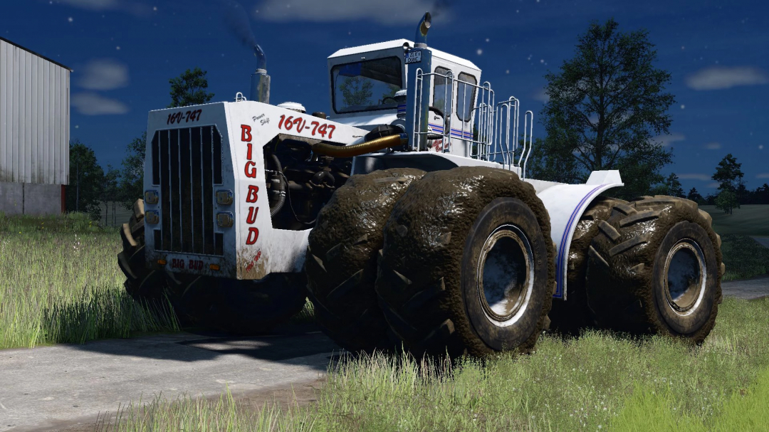 Big Bud 747 tractor mod in FS25, parked on grass, showing detailed mud-covered wheels.