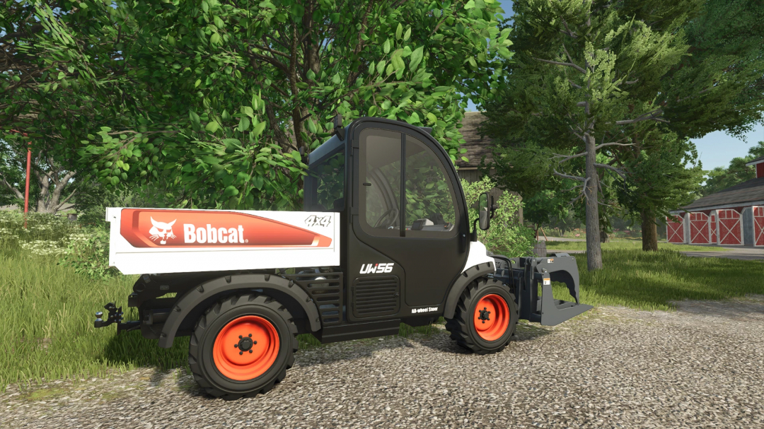 Bobcat Toolcat UW56 FS25 mod in a farm setting with trees and a barn.