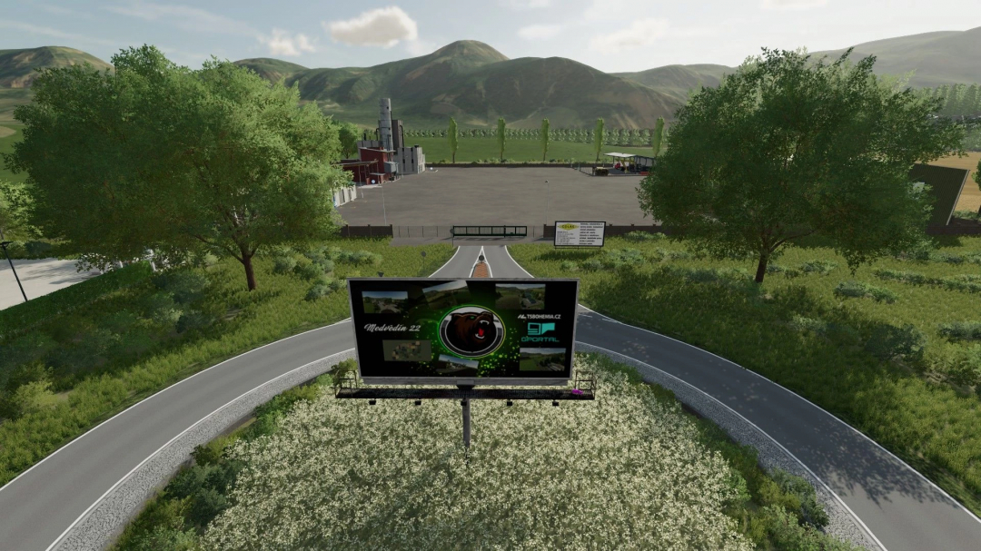 Scenic landscape in FS22 mod Bohemia Country v1.0.0.0 with billboard and industrial facility.