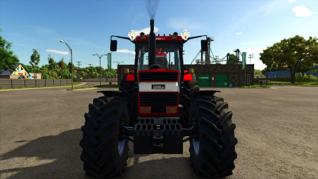 Case IH 1455XL tractor mod in Farming Simulator 25, viewed from front with background scenery. FS25 mods.