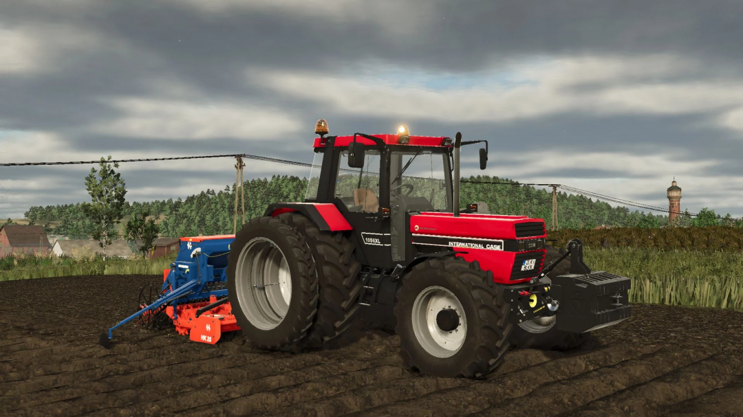 Case IH 56 Series tractor in FS25 mod, plowing field under cloudy sky.