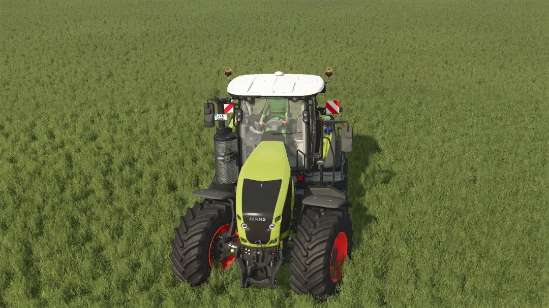 Claas Axion 960TT tractor in FS25 mod, viewed in a lush green field.