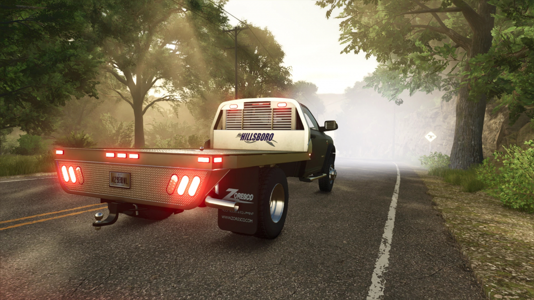 Dodge Ram 5500 mod in FS25, parked on a misty forest road.