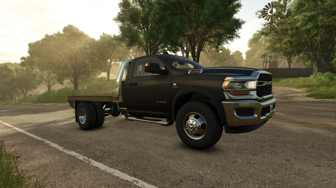 Dodge Ram 5500 mod driving on a scenic road in FS25, showcasing realistic vehicle design.