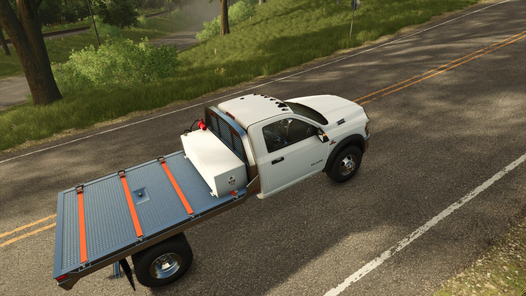 Dodge Ram 5500 mod in Farming Simulator 25, showcasing a flatbed truck on a rural road. FS25 mods offer realistic vehicle models.