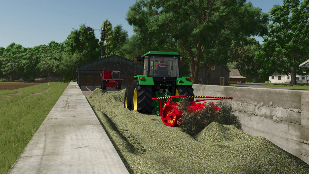 Tractor using Elho LK 215 mod in FS25, moving grass silage in a farmyard scene.