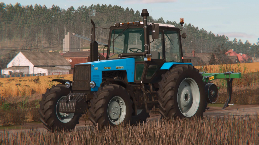 FS25 mod shows a blue tractor with the Vehicle Shader v1.0.0.0. in a rural setting.