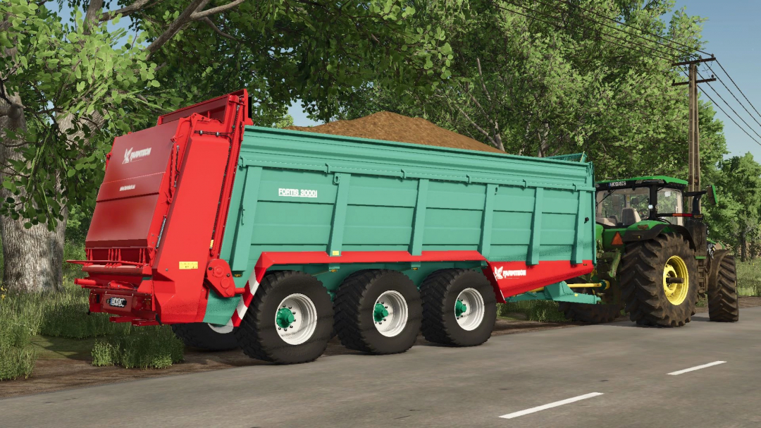 Farmtech Fortis 3000 trailer mod for Farming Simulator 25, filled with soil and attached to a tractor.