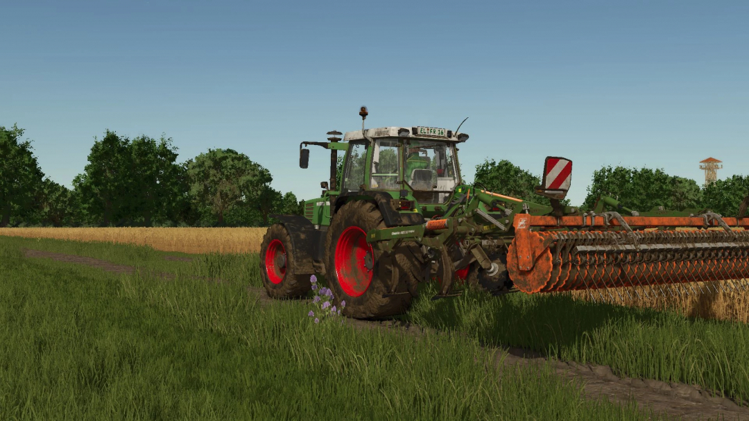 Fendt Favorit 500 tractor mod in FS25, cultivating a field amidst lush greenery in Farming Simulator 25 mods.