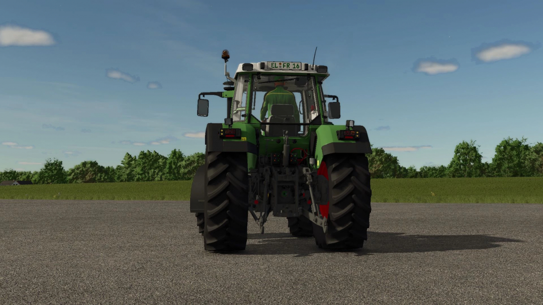 Rear view of Fendt Favorit 500 tractor mod in FS25 on a clear day.