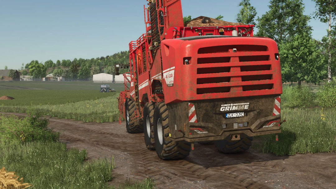 Grimme Rexor 6300 mod in FS25, red harvester on a farm road.