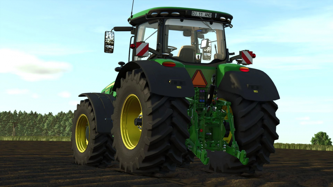 Back view of John Deere 8R 2016 tractor mod in Farming Simulator 25. Showcasing realistic tire and equipment detail.