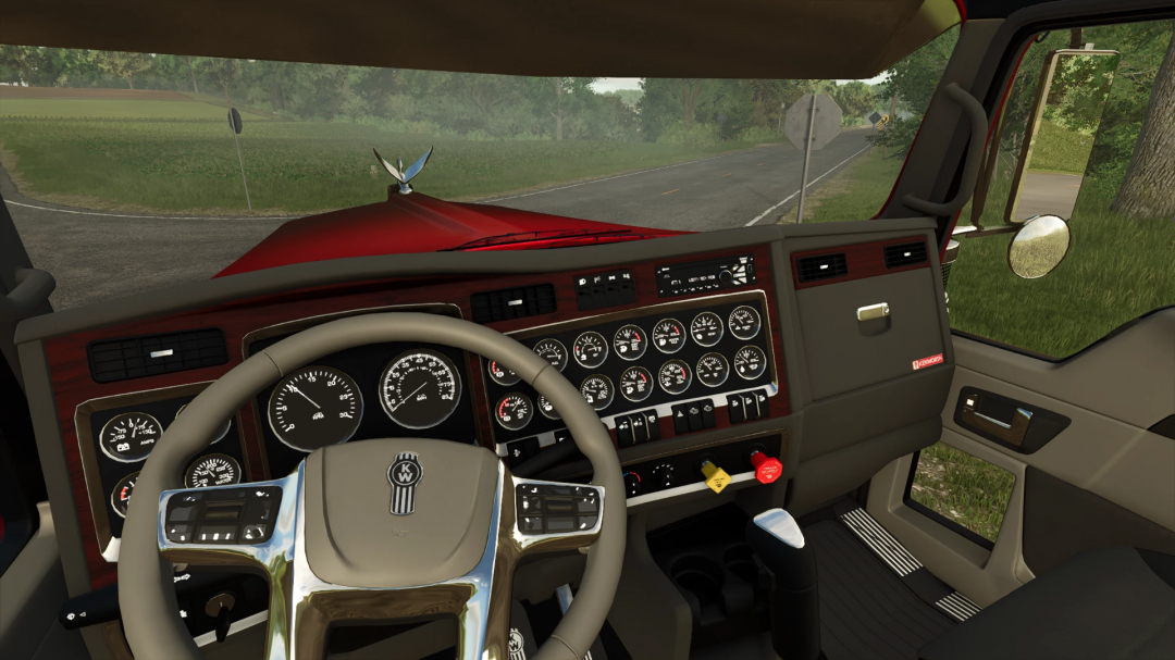 Interior view of Kenworth W900L truck mod in FS25, showing dashboard and steering wheel.