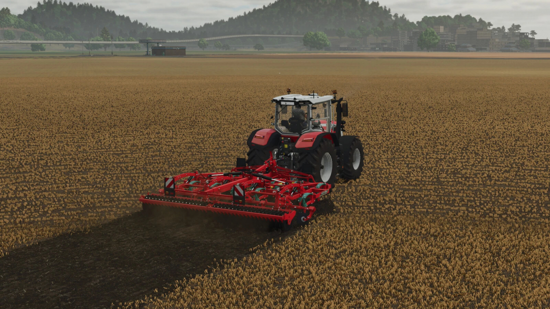 FS25 mod Kverneland Enduro Pro 5000F cultivating a field with a tractor in Farming Simulator 25.