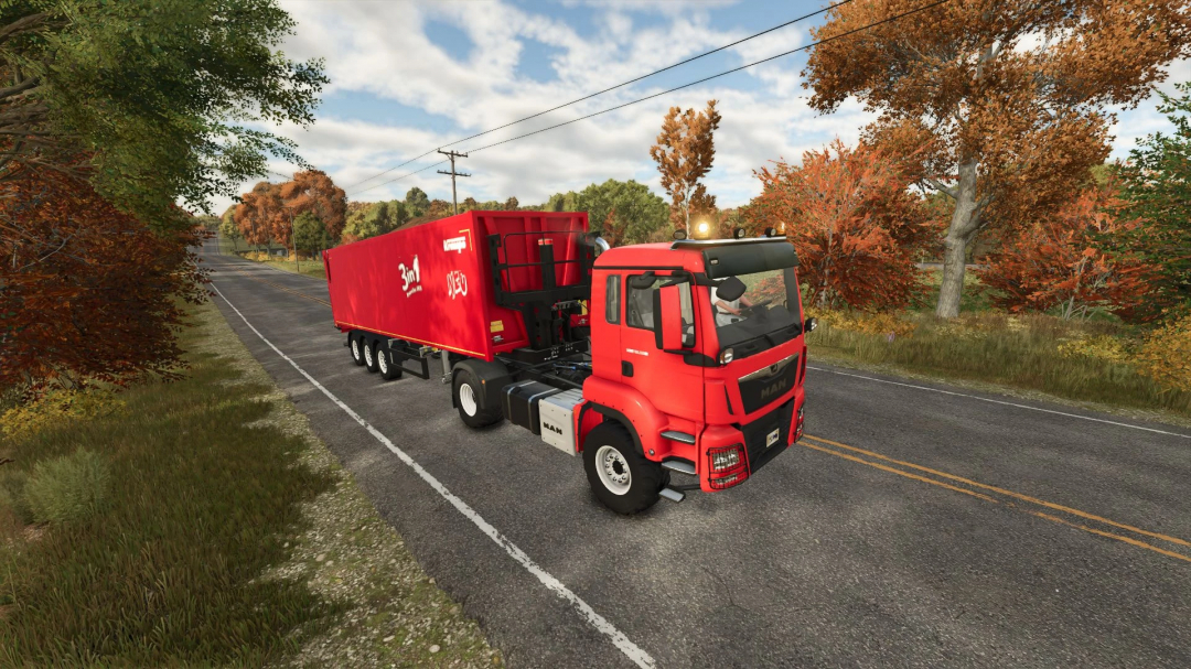 MAN TGS 18500 truck mod for Farming Simulator 25 on a road with autumn trees.