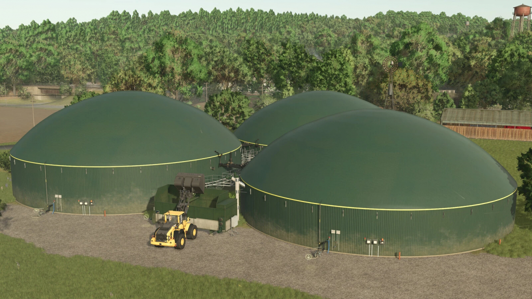 Medium Biogas Plant in FS25 mod, featuring large green domes and front loader on a grassy landscape.