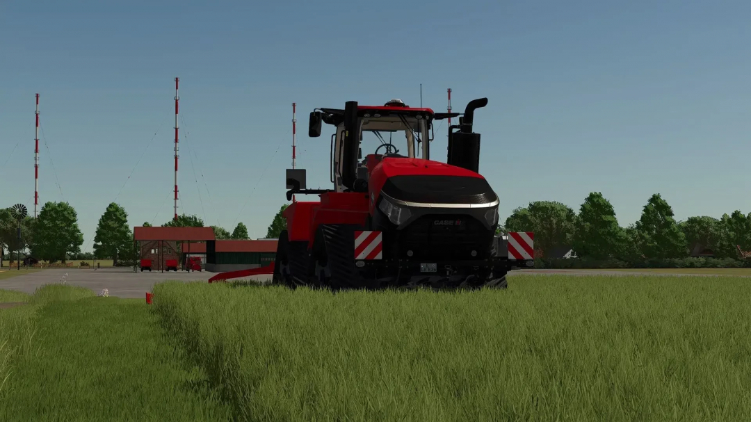 Red tractor on Papenburger Map 4K in FS25 mod, surrounded by greenery and radio towers.