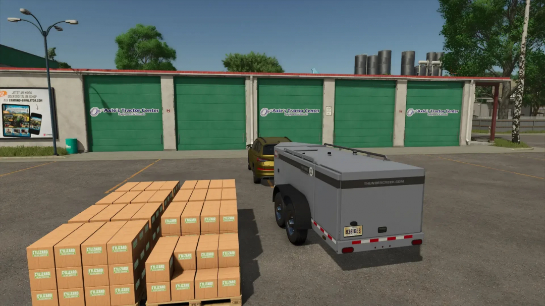 FS25 Production Pack v1.0.0.0 mod showing a parking lot with crates, a truck, and a tractor center.